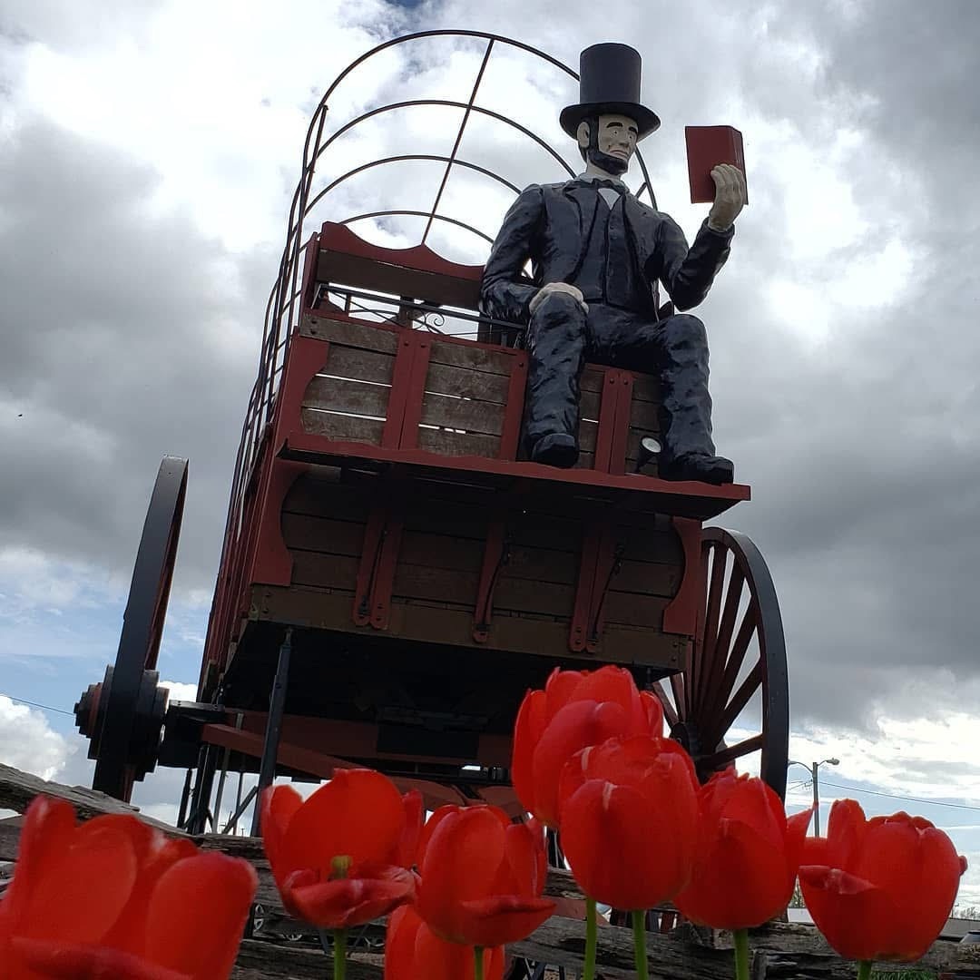 Lincoln in a covered wagon. Lincoln, IL